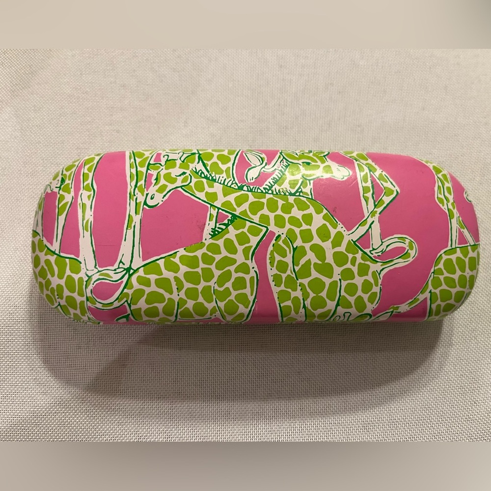 Lilly Pulitzer glass case, pink and green with giraffe print.